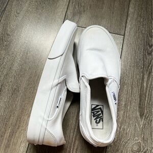 Vans slip on white shoes